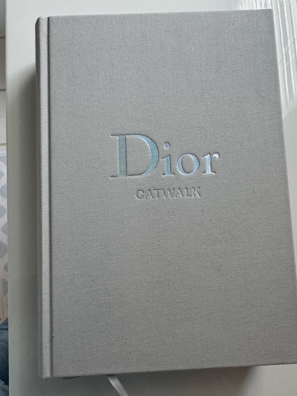 Dior Catwalk by Yale Press NWT  Hardcover Book - Light Gray with Iridescent Logo - Picture 3 of 4